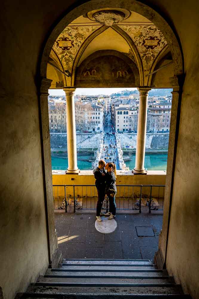 Posed couple during an engagement photography session inside the a castle