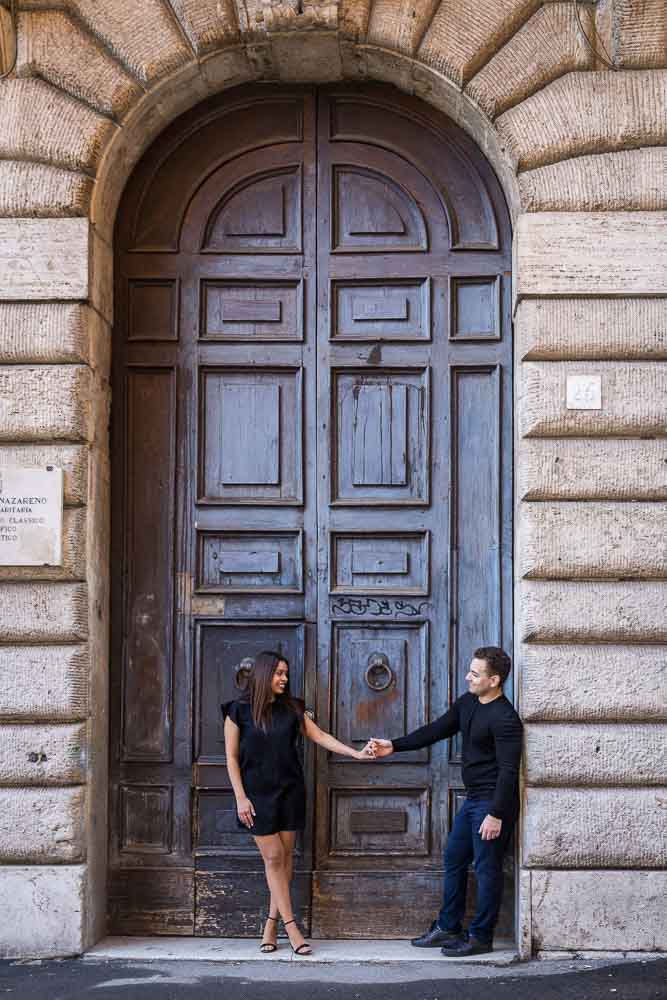 Posing in front of a roman doorway