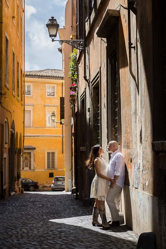 Romantic photoshoot in the roman cobble stone street alleyways. Image by Andrea Matone photographer