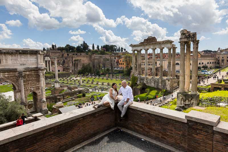 Posed before the ancient roman forum. Couple photo session in Rome