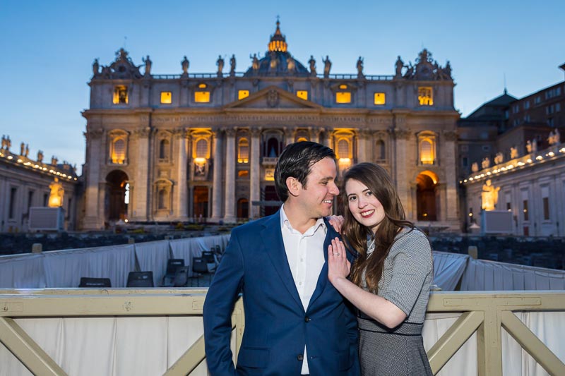 Coupe portrait together in front of the Basilica lit up at night