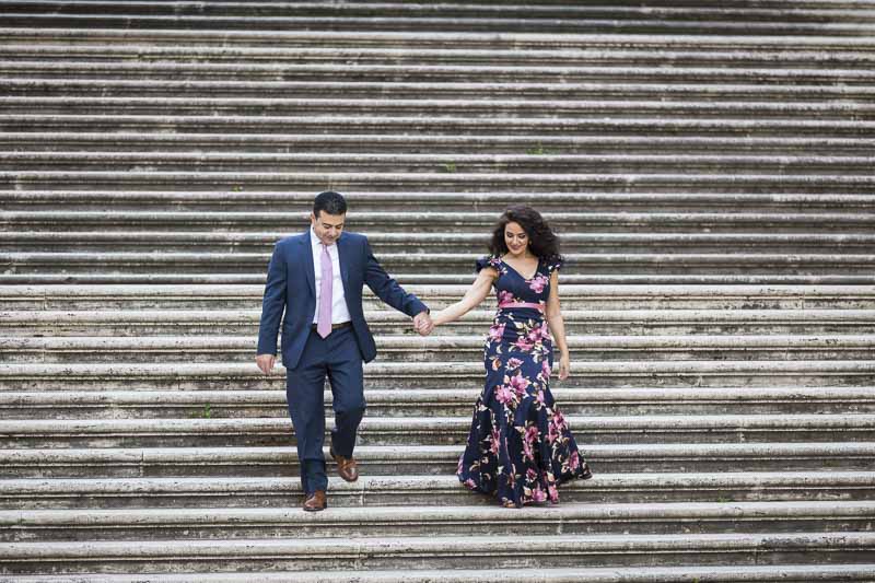 Descending stairs holding hands