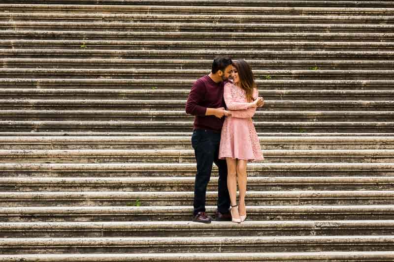 Couple posed on a staircase