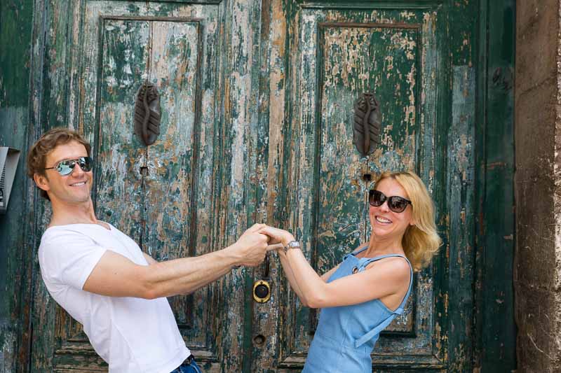 Pulling hand in front of an ancient doorway