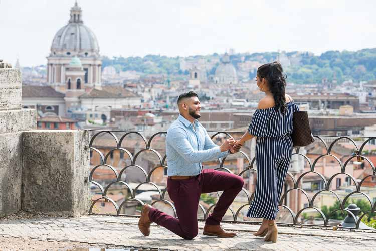 Knee down wedding marriage proposal overlooking the roman skyline