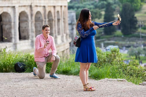 Setting up the selfie stick for a couple photo