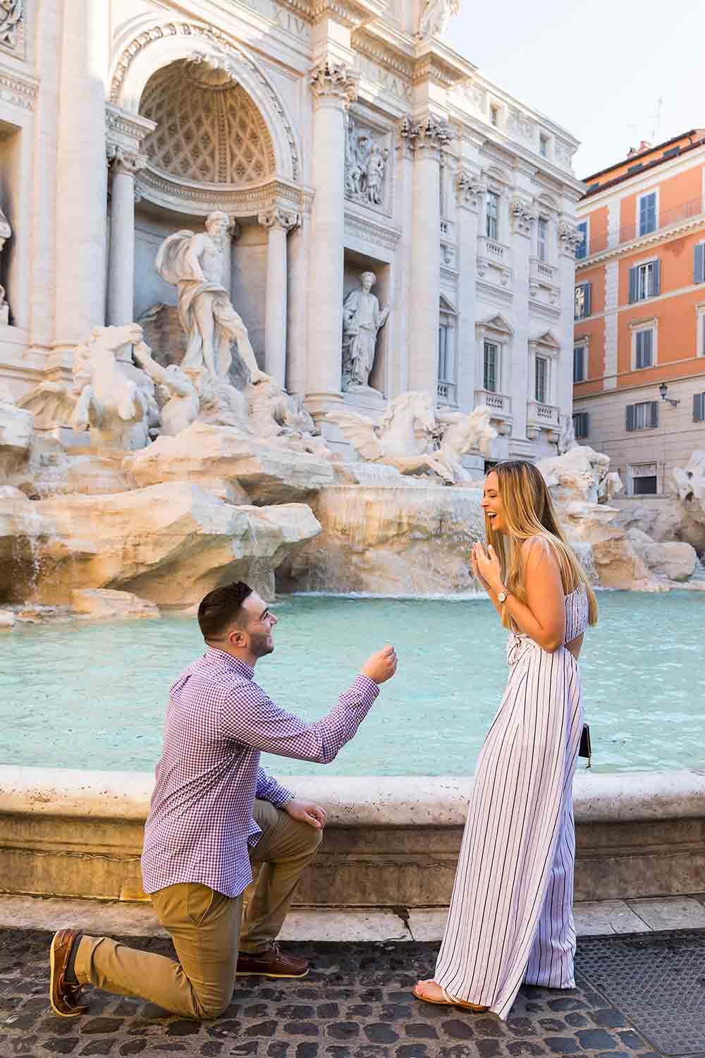 Surprise wedding proposal in Rome at the Trevi fountain