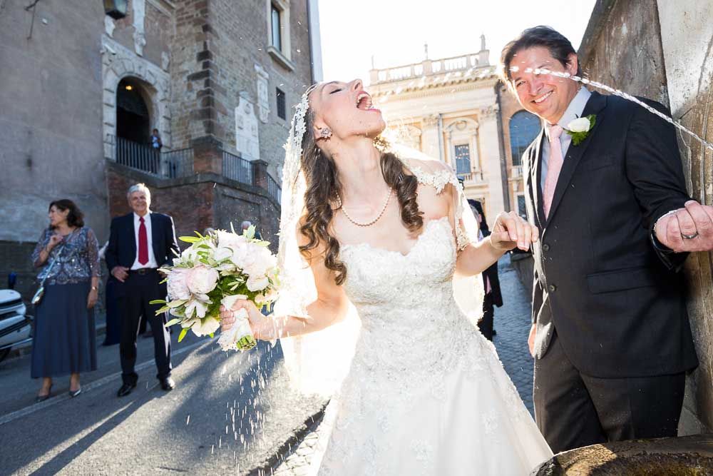 Bride drinking water on the wedding day