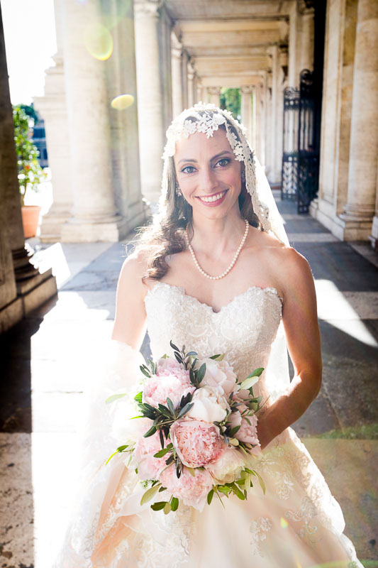 Beautiful bridal portrait taken in Piazza del Campidoglio in Rome Italy before entering Town Hall 