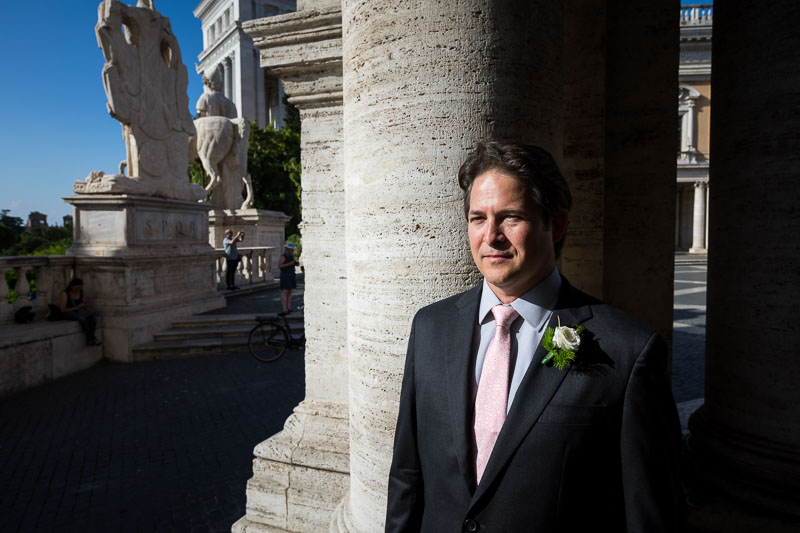 Groom portrait under ancient marble columns