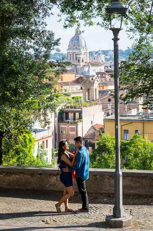 Couple engagement photo session over the roman rooftops