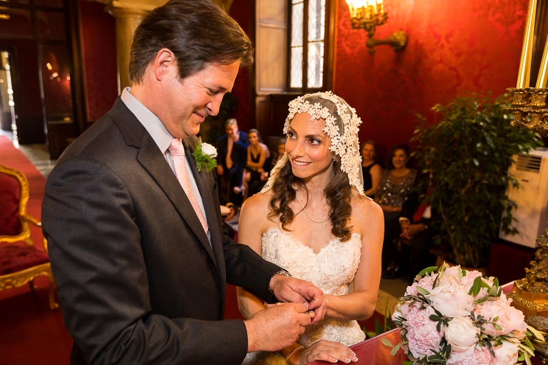 Bride and Groom exchanging matrimonial rings