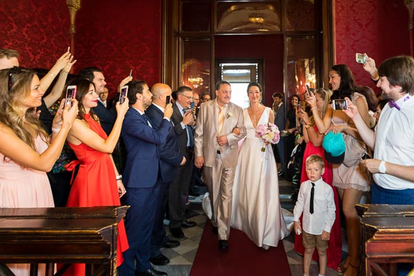 The bride making her entrance into Campidoglio Town Hall red room to get married