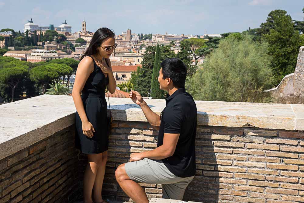 Just engaged Orange Garden Surprise Proposal photographed at the terrace of Giardino degli Aranci in Rome Italy 