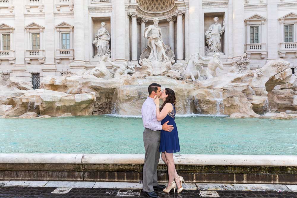 Kissing in at the Trevi fountain in Rome Italy