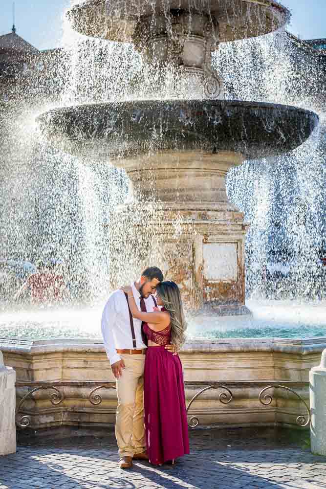 Portrait picture under the water splashes coming from the fountains in Saint Peter's square. Water is in the air 