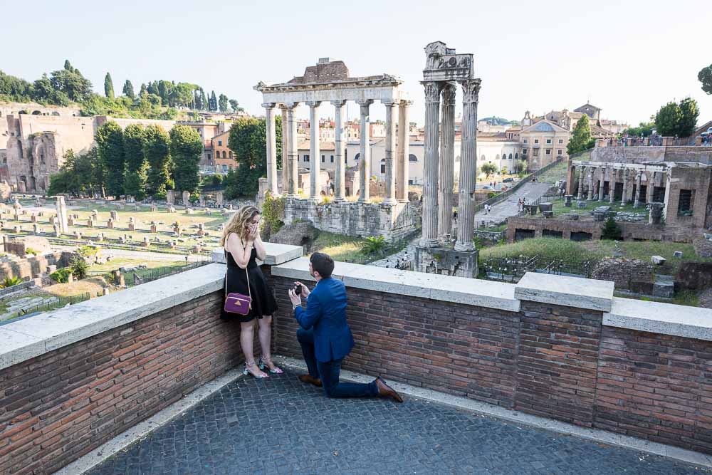 Roman Forum Proposal candidly photographed at Piazza del Campidoglio overlooking the ancient ruins in the background