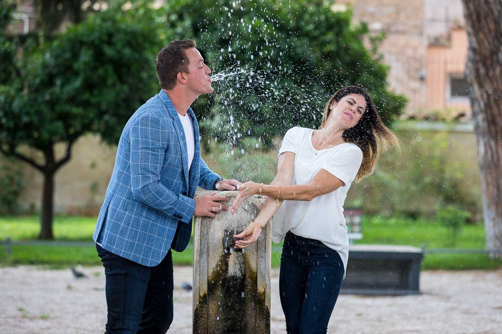 Playing around with a water fountain during a photo shoot