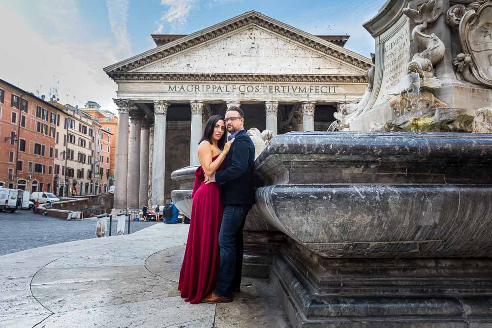 Honeymoon portrait picture standing next to the central obelisk water fountain with the roman pantheon building in the background