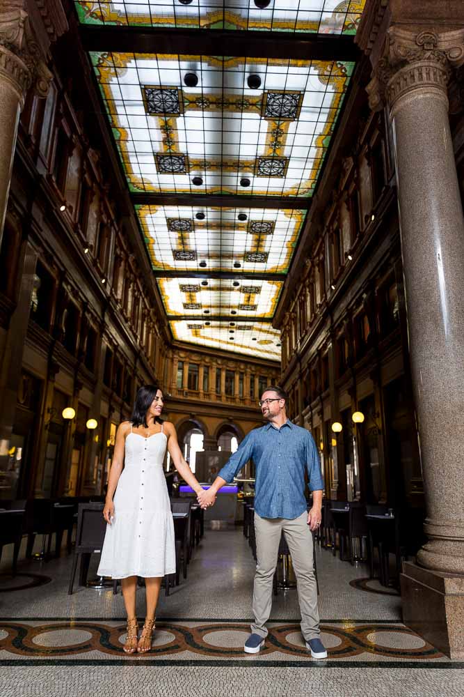 Paper dolls pose during a photo shoot in Galleria Alberto Sordi building