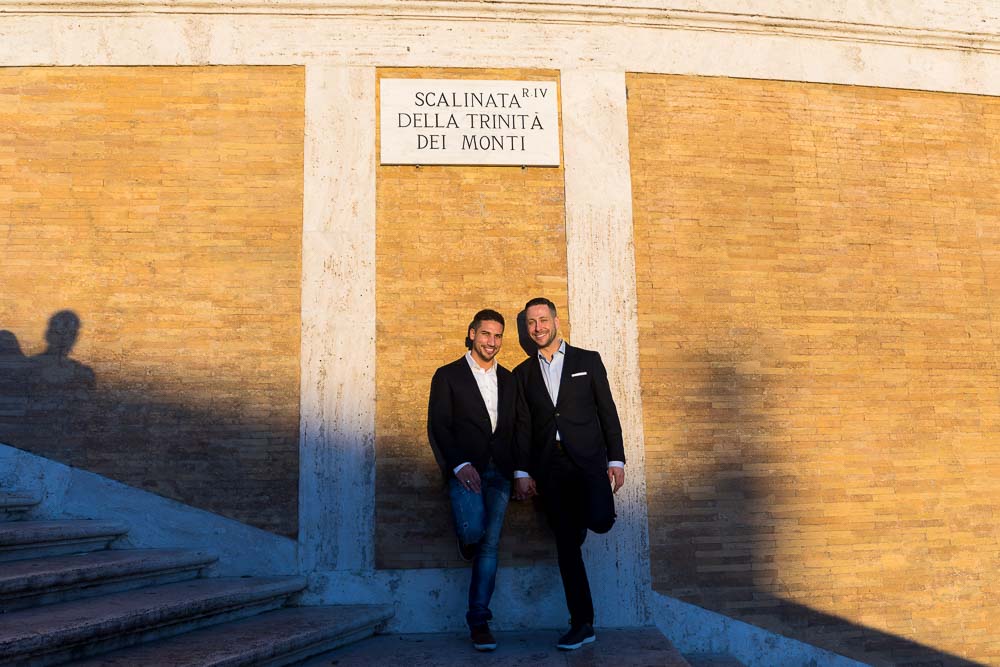 Portrait picture standing underneath the Scalinata della Trinita' dei Monti sign