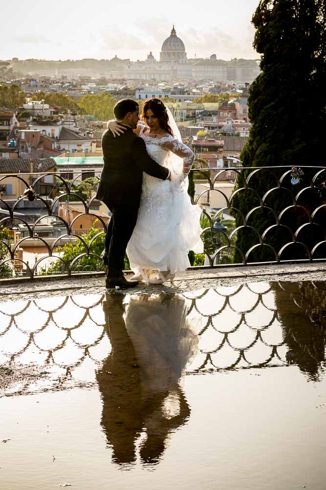 Sunset newlywed pictures during the golden hour overlooking the city of Rome from the above Pincio park