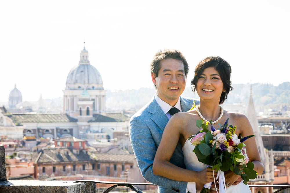 Wedding portrait of a married couple celebrating marriage in the city of Rome Italy