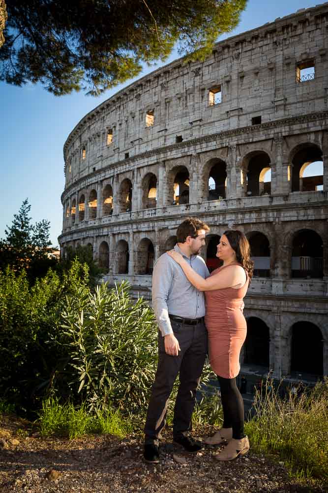 Posed engagement image in front of the coliseum