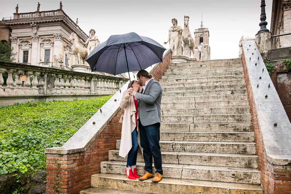 Engagement photo shoot in Rome under the rain with an umbrella