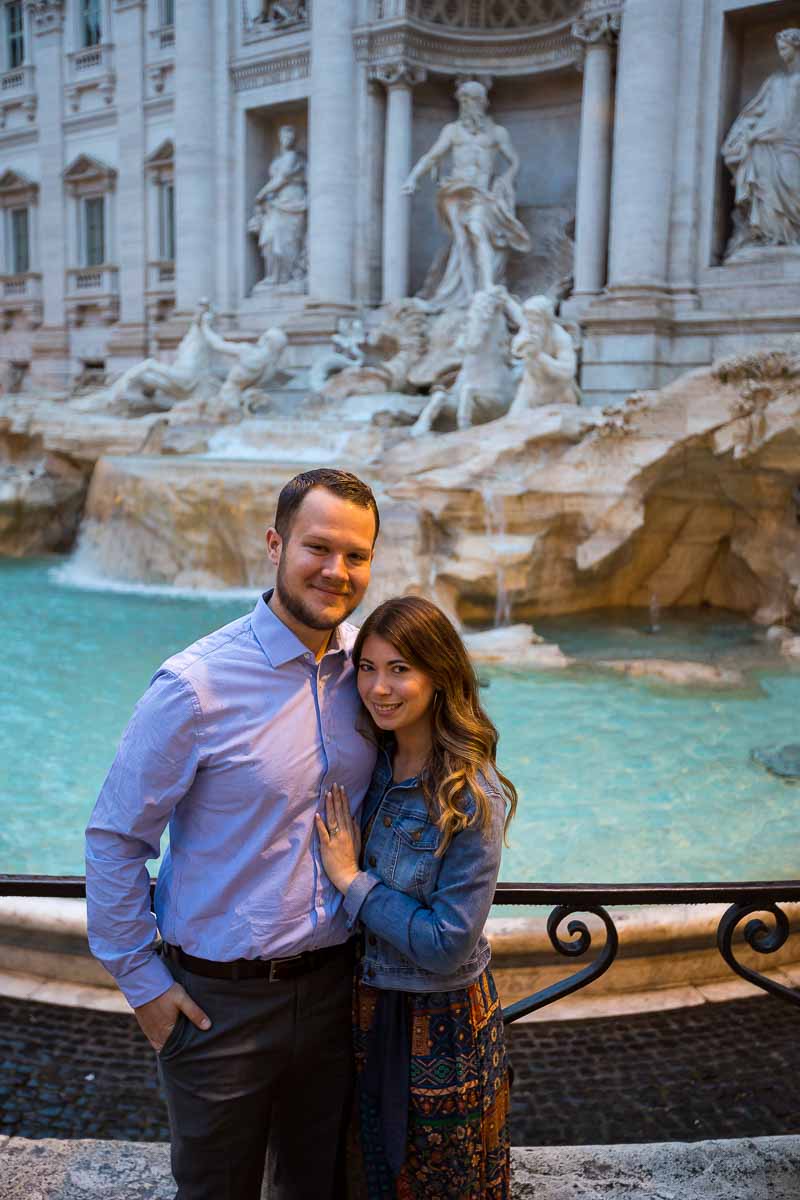 Couple portrait posed in front of the Trevi fountain