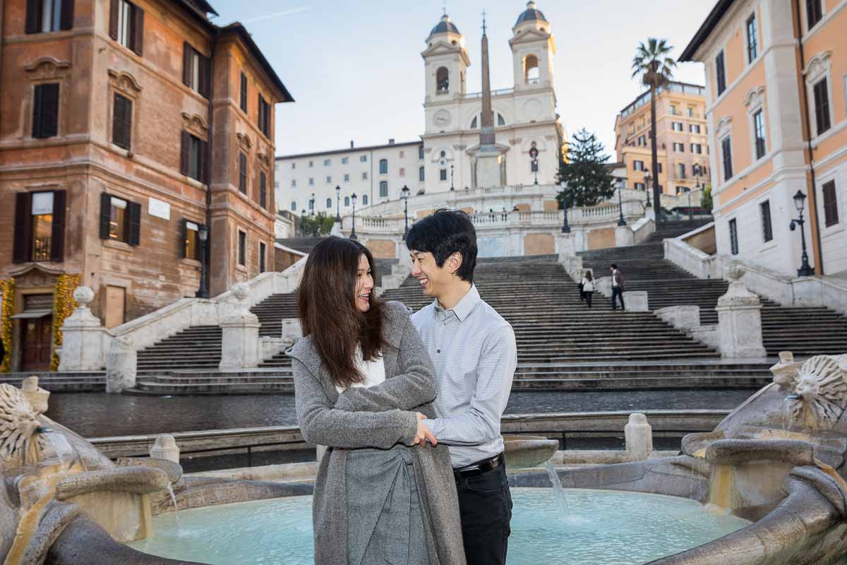 Couple posed portrait during a photo session in Rome at the Spanish steps