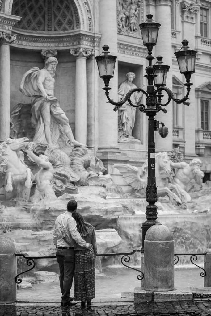 B&w image while admiring the beauty of the fountain. Rome, Italy.