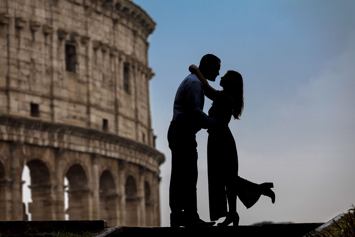 Silhouette photography taken in front of the Coliseum. Honeymoon Photo Shoot 