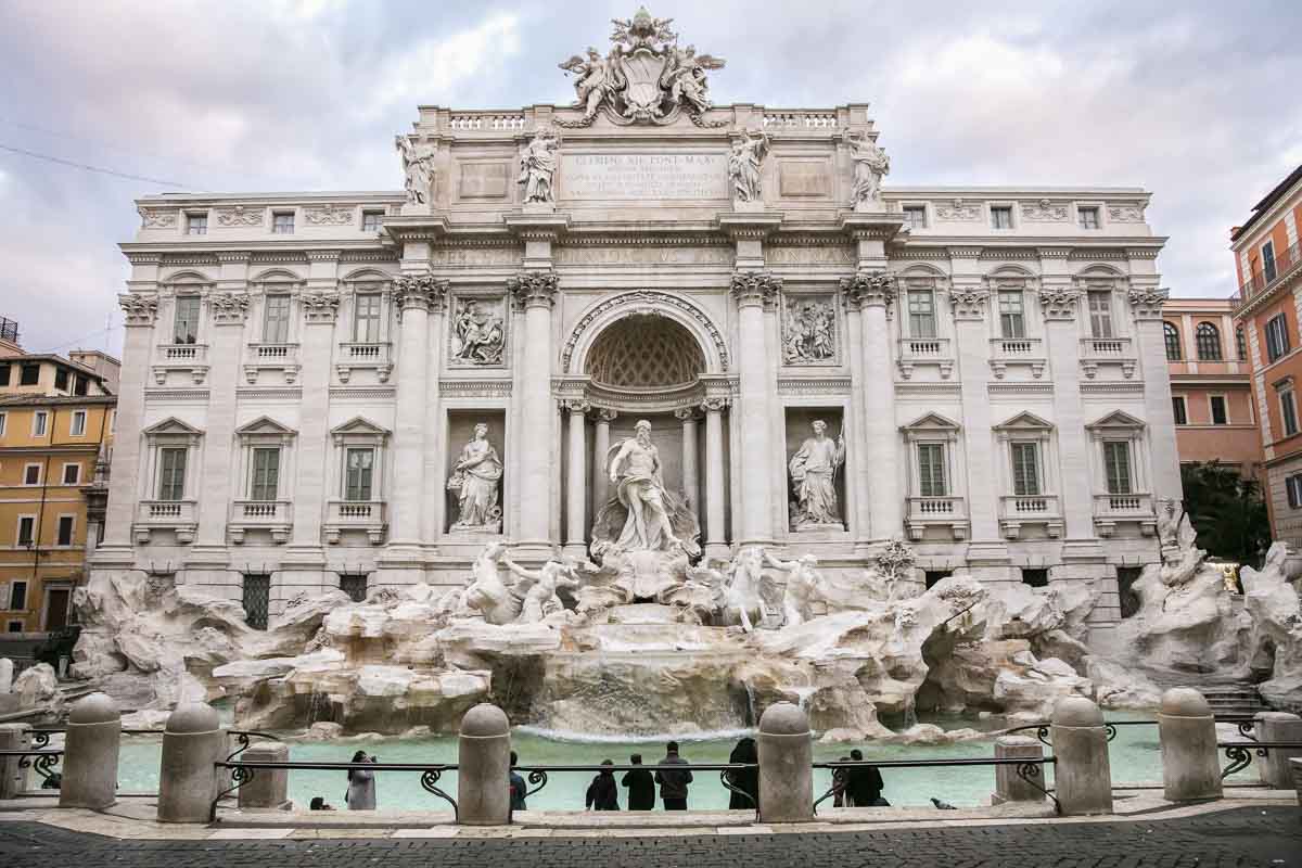 Front view of the Trevi fountain in the early morning