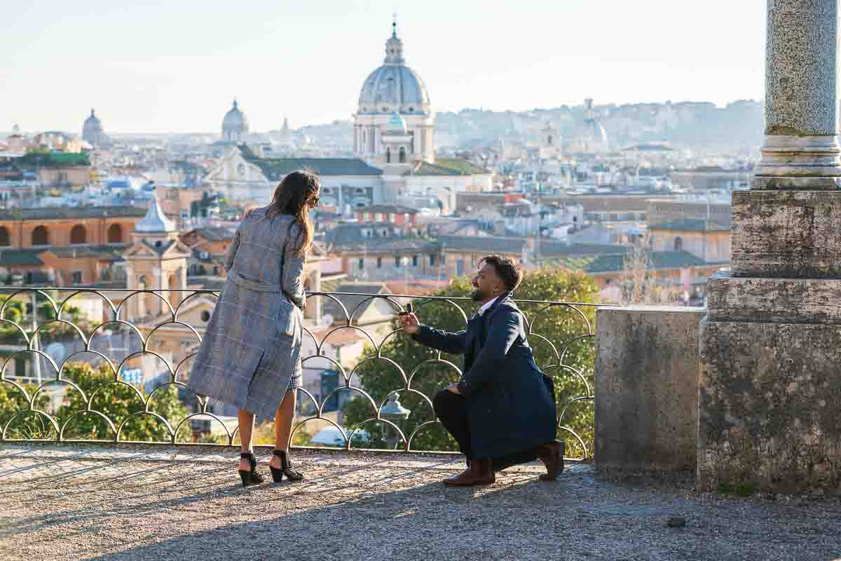 The moment of the proposal with the ring and one knee down