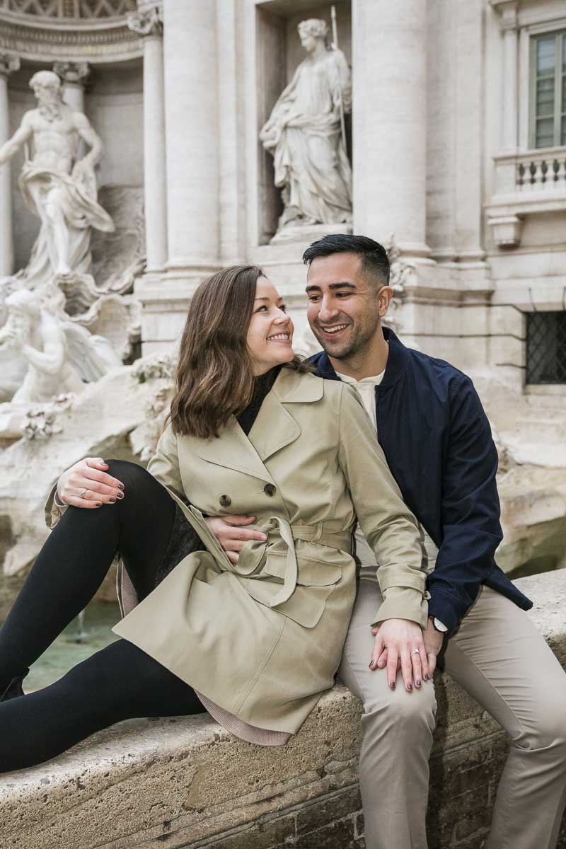 Just engaged couple posing sitting down