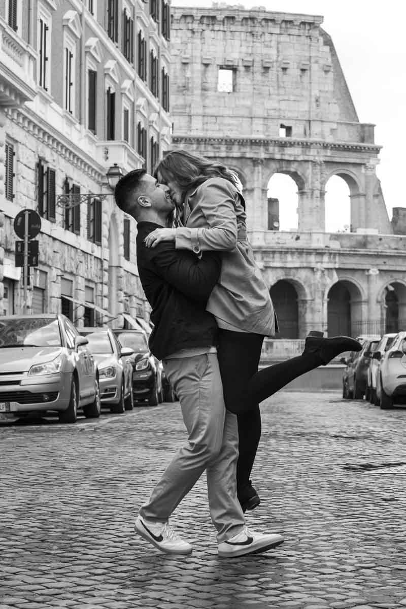 Black and white image version of a couple kissing during a Rome engagement photo shoot