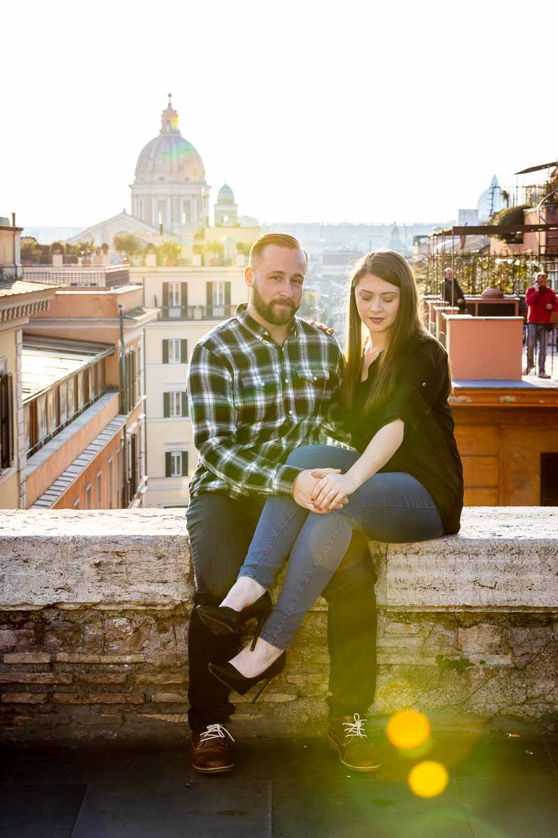 Romantic couple portrait photographed against the smooth golden sun setting light