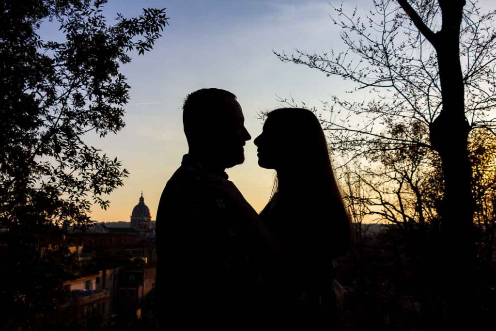 Silhouette image taken at sunset during an engagement photo shoot