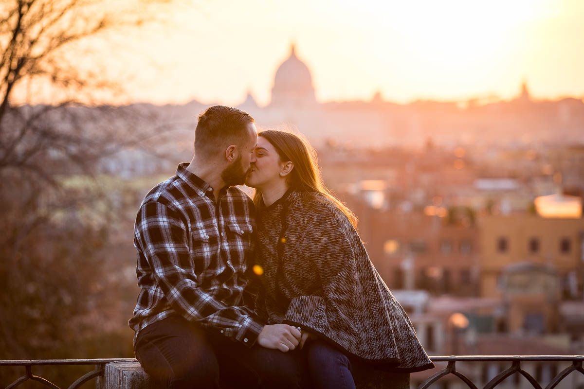 In love in Rome photoshoot. Couple kissing at sunset