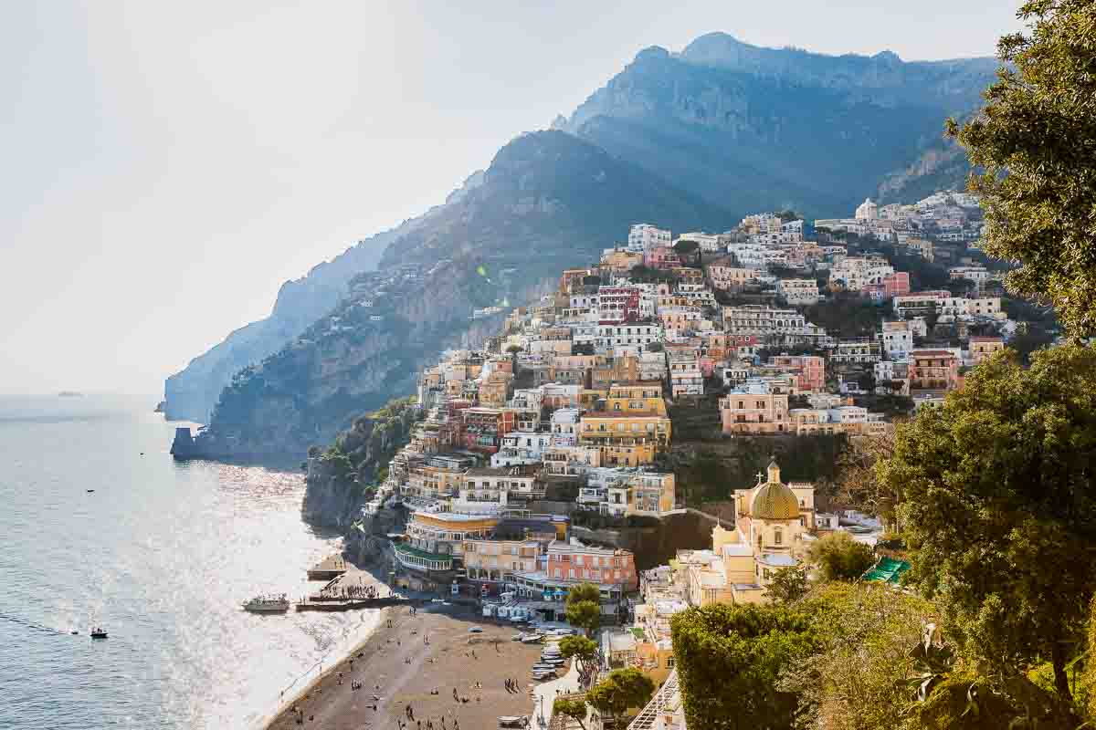 The town of positano at sunset