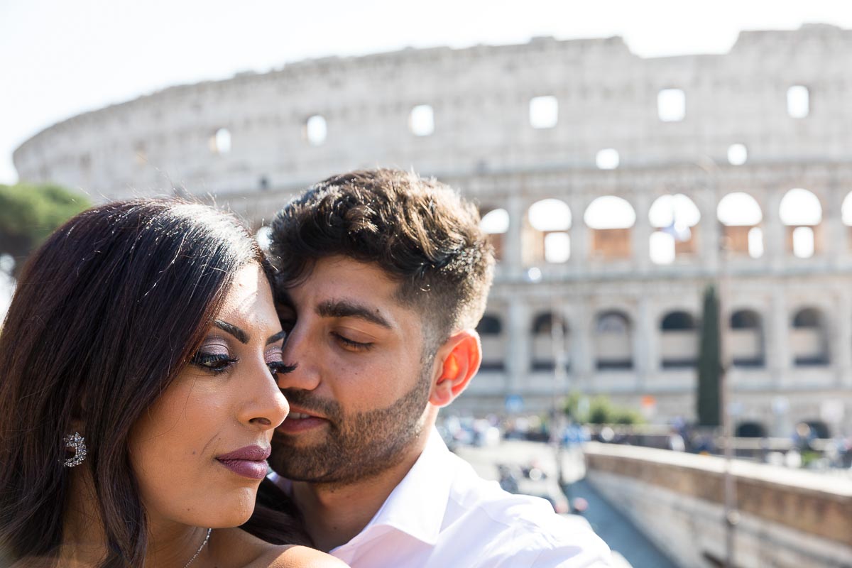 Close up couple portrait before the roman coliseum