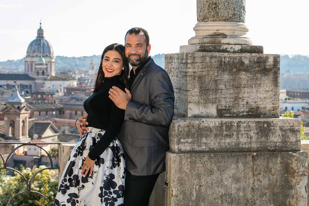 Posing together from the Pincio park overlook with the ancient city of Rome in the background