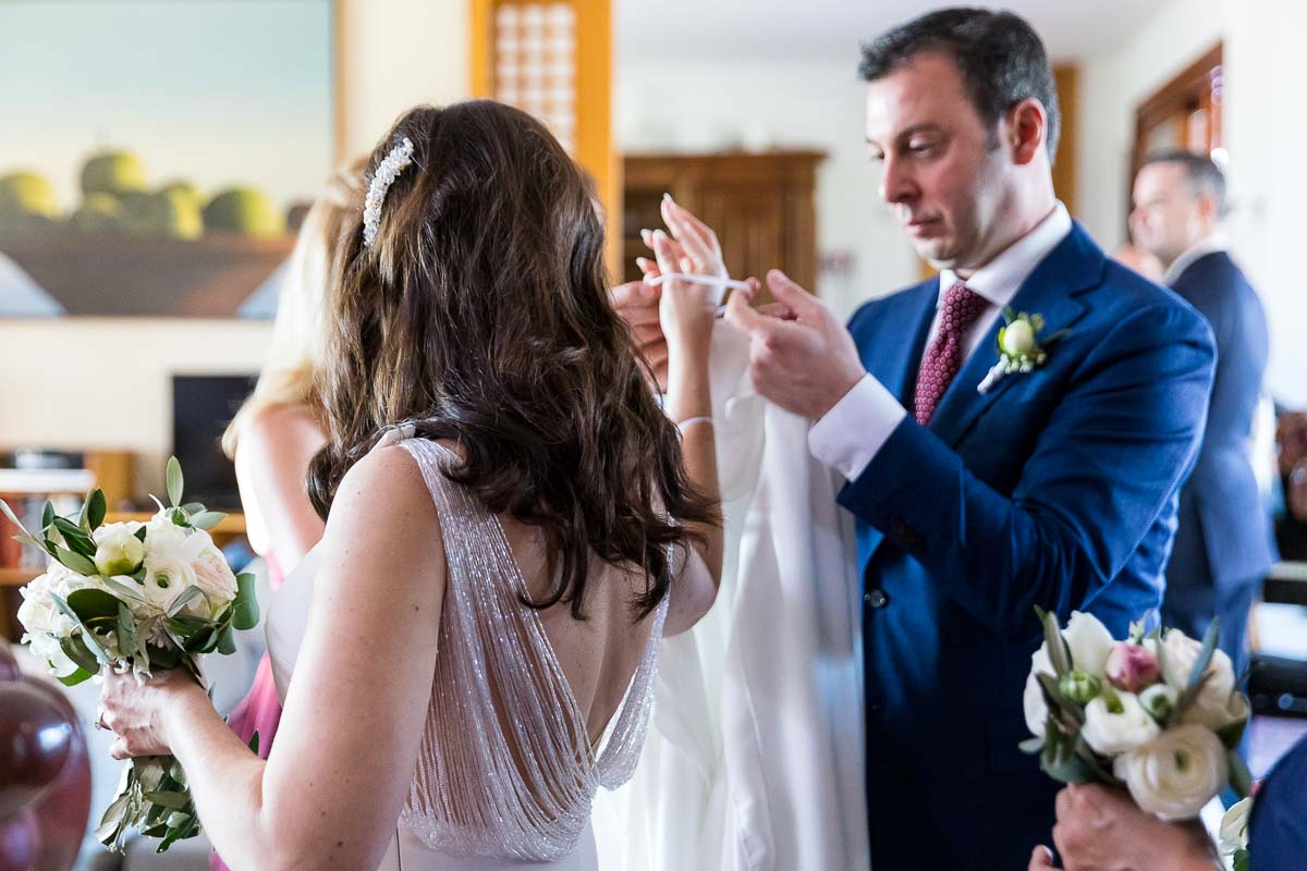 Bride and groom getting ready