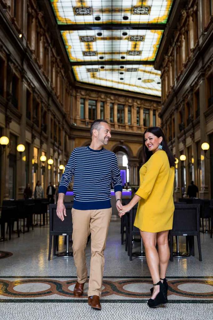 Walking together in Rome taking couple pictures in Galleria Alberto Sordi