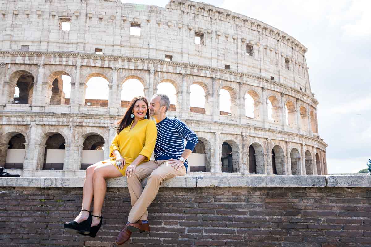 Sitting down in front of the Colosseum during a photography session