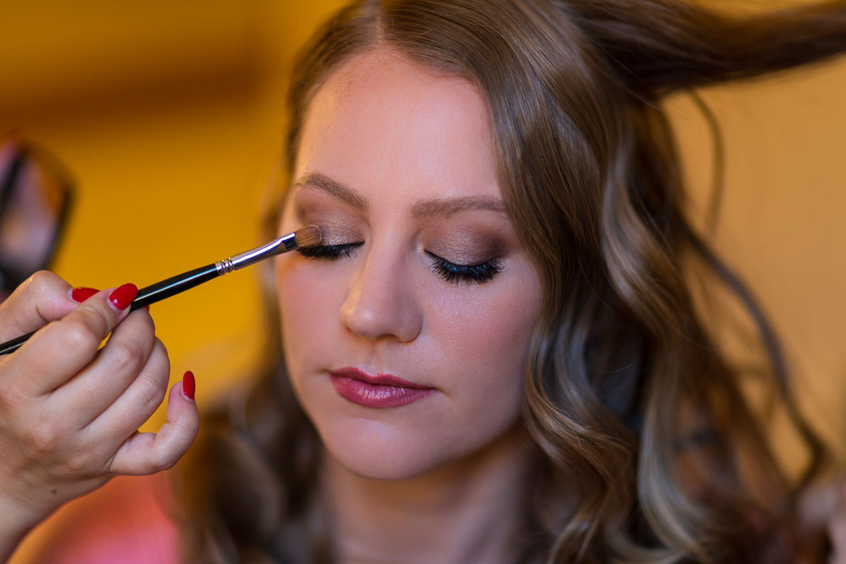 Bride eyeshadow makeup preparation close up