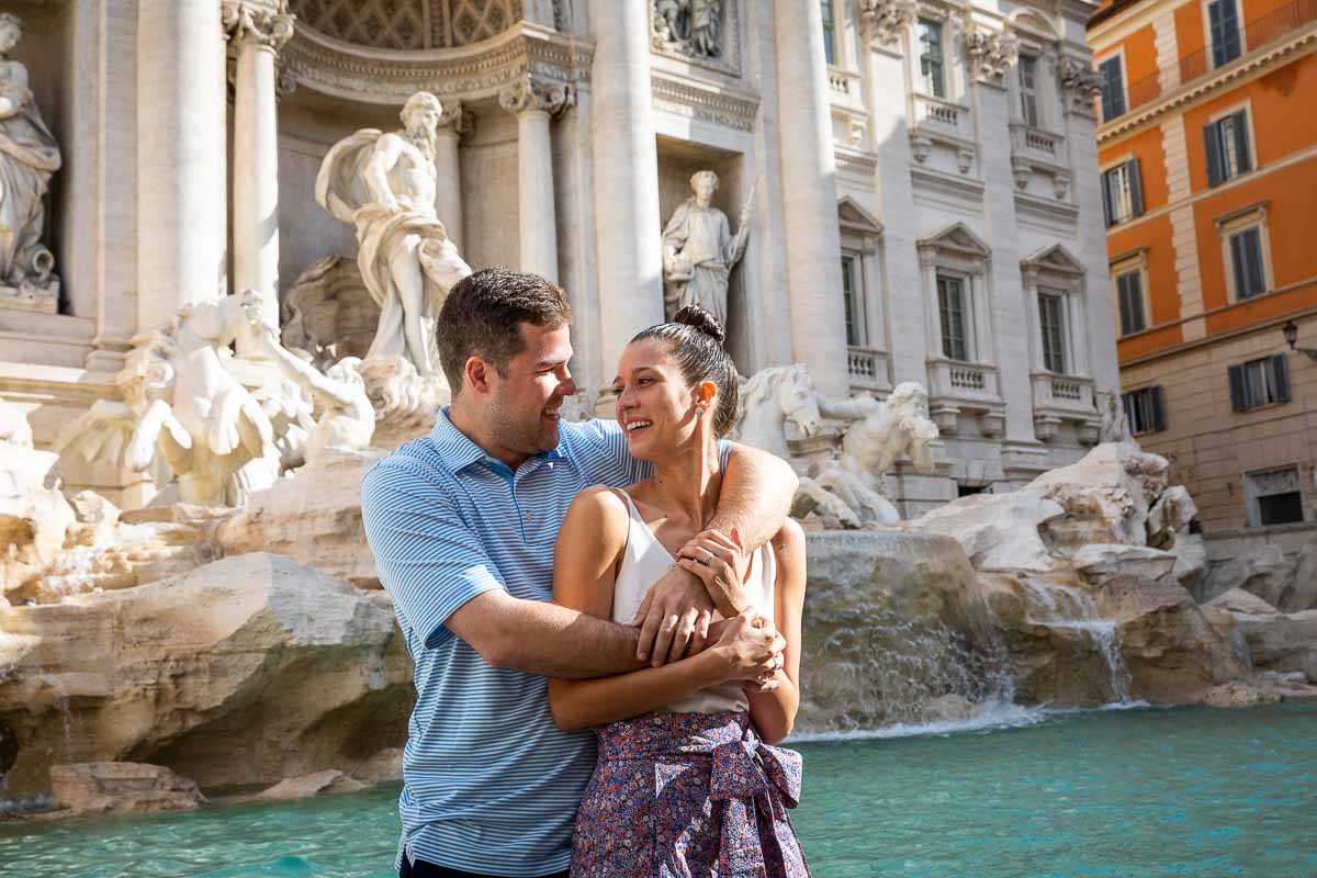 Couple portrait picture taken in Rome's Trevi fountain