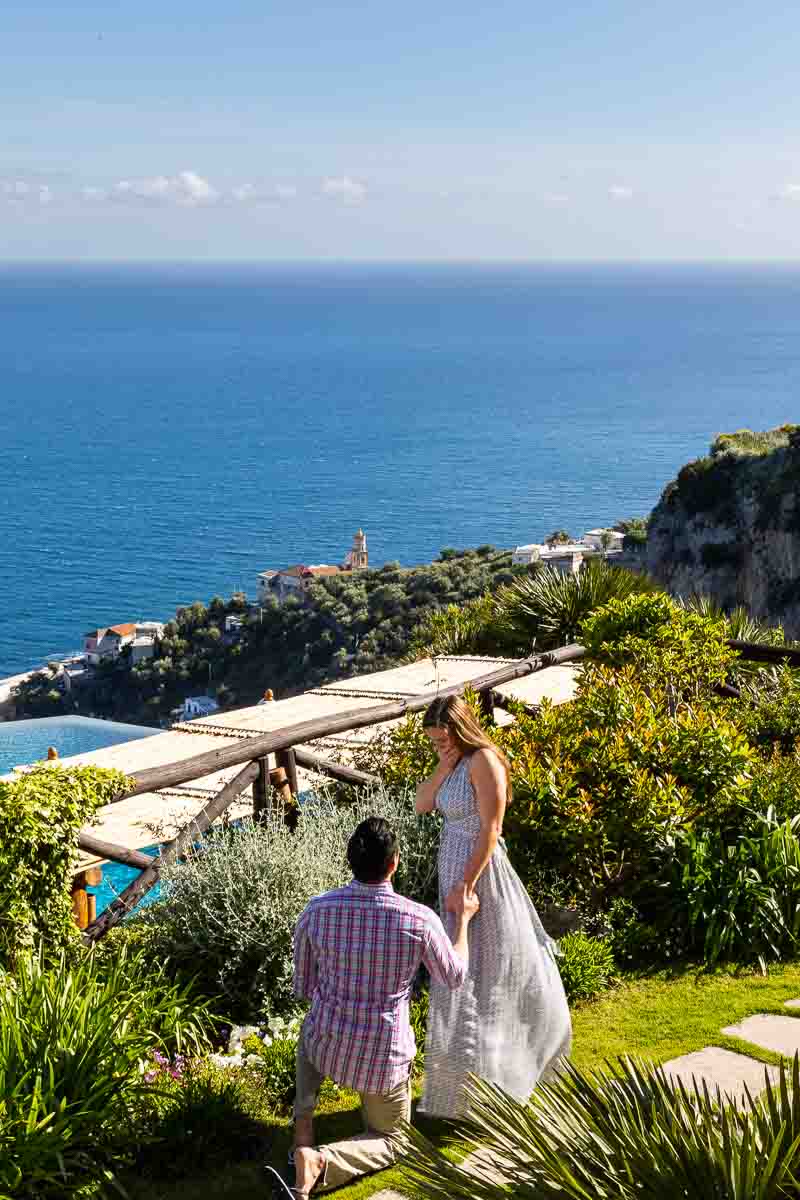 Proposing marriage overlooking the sea in the distance. Amalfi coast engagement proposal