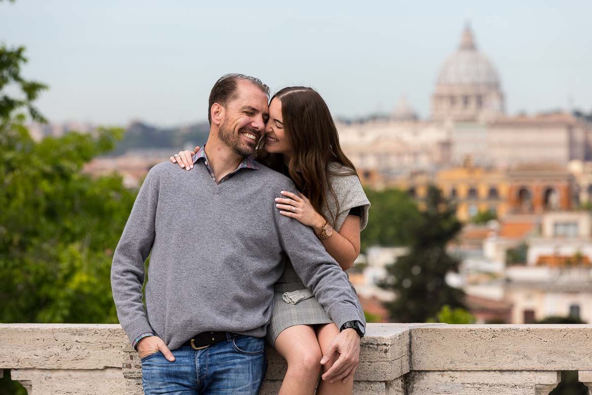 Couple close with Saint Peter's dome cathedral in the far distance